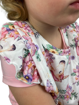 Close up of frilled baby bib