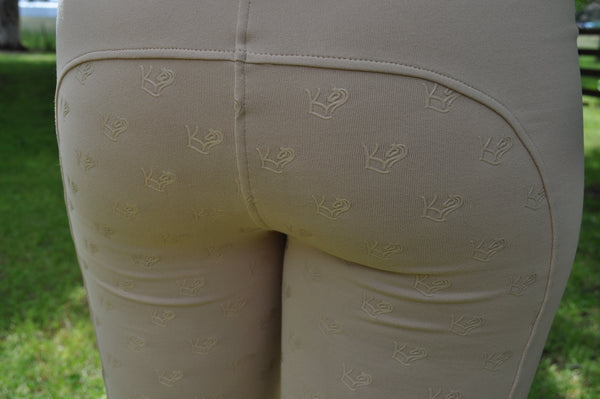 Close up of Lucky Kids Equine Logo Grippers on back of Beige Competition Jotties