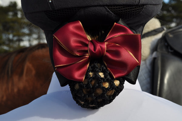 Black hair net with deep red sateen bow and gold edges