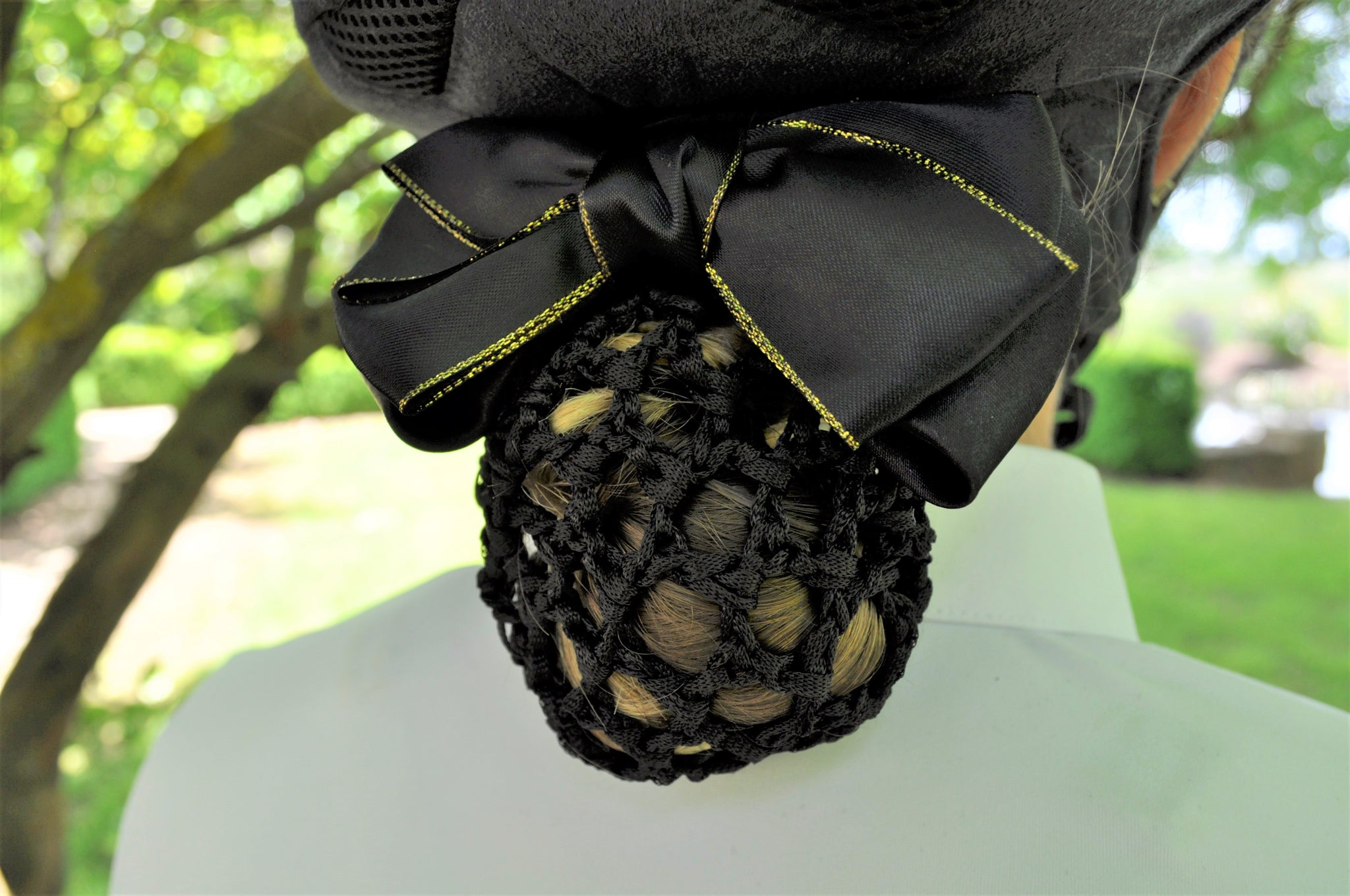 Black hair net with black sateen bow with gold edges