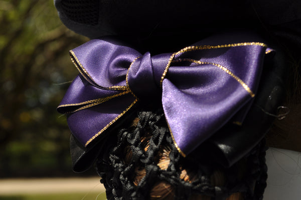 Black hair net with purple sateen bow and gold edges