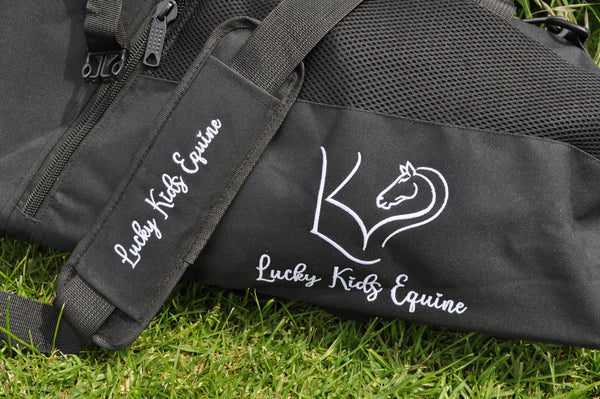 Close up of Lucky Kids Equine Embroidered Logo on bag